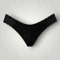 Calcinha W One Fio Dental com Laterais em Renda Sem Costura Preta