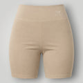 W One Brand Store women's beige polyamide biker shorts with a wide waistband and subtle logo detail.