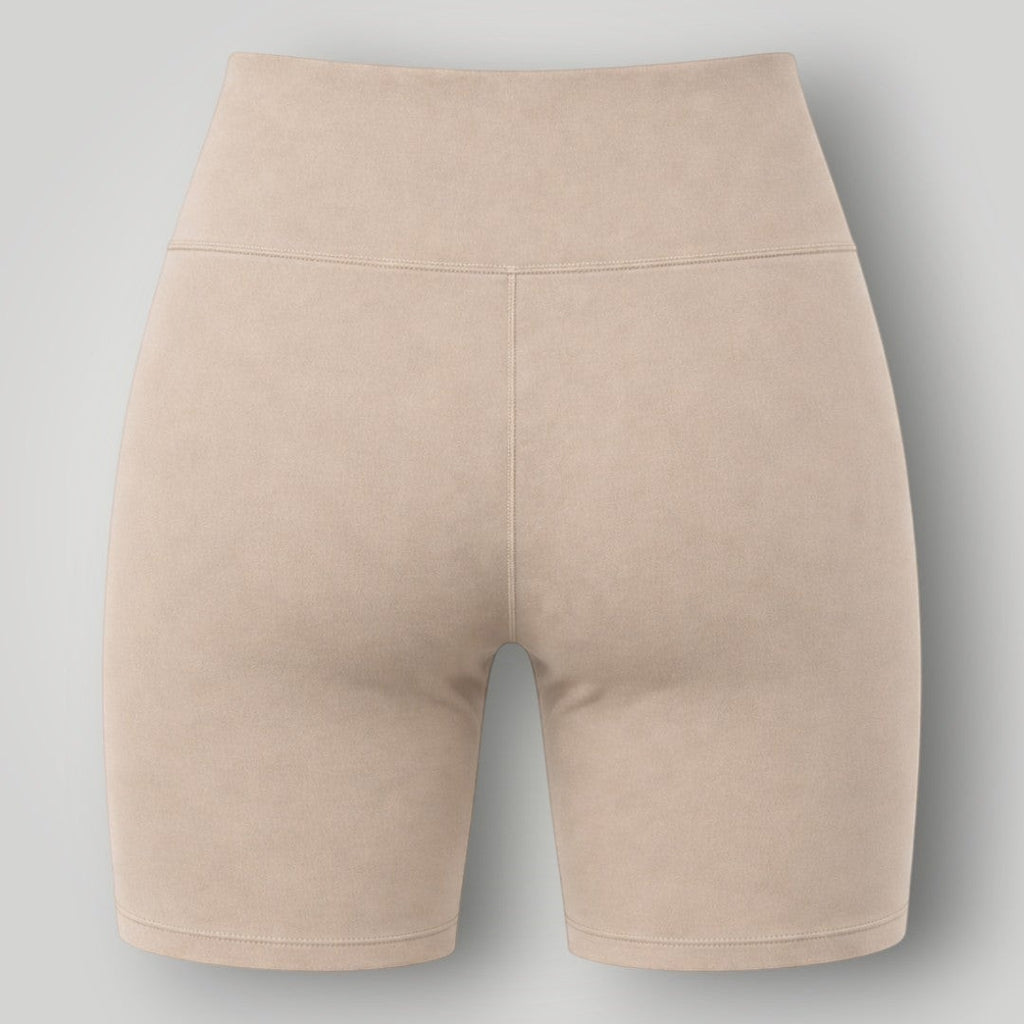 W One Brand Store women's beige polyamide fitness shorts with a wide waistband and seamless design.