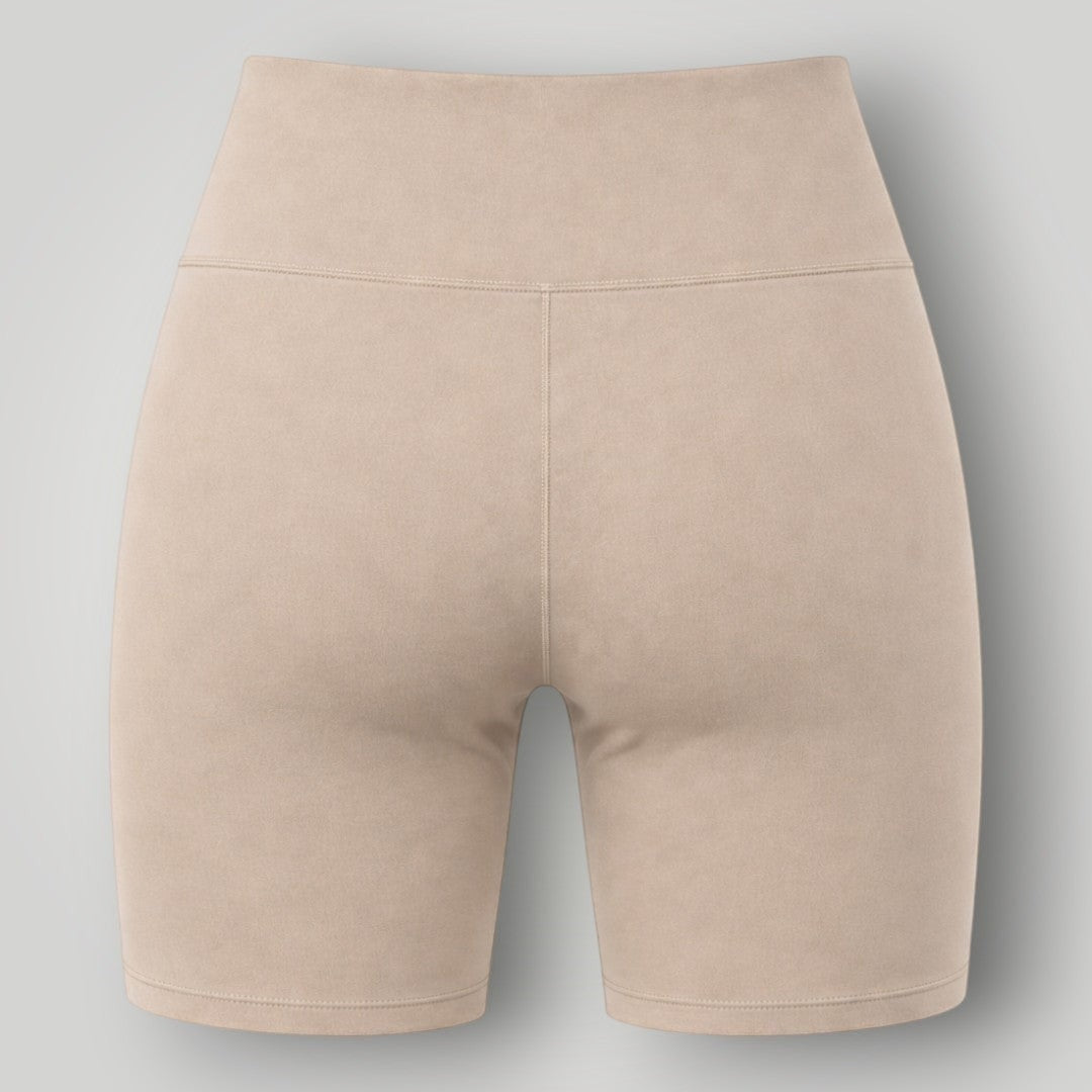 W One Brand Store women's beige polyamide fitness shorts with a wide waistband and seamless design.