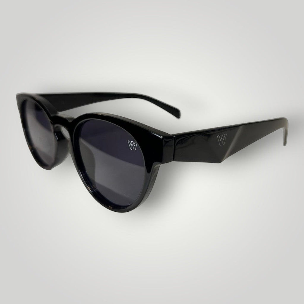 W One Brand Store black acetate retro round sunglasses with black gradient lenses and black temples featuring a subtle 'W' logo.