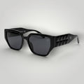 W One Brand Store black acetate sunglasses with thick temples, dark grey lenses, and a textured design. UV400 protection.
