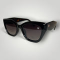W One Brand Store black cat-eye sunglasses with tortoiseshell accents and gradient black lenses. Features UV400 protection.