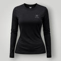 W One Brand Store black long-sleeve fitness t-shirt made of polyamide and elastane with crew neck and subtle logo.