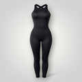 W One Brand Store black polyamide fitness jumpsuit with crossed back straps and a flattering fit, ideal for workouts.