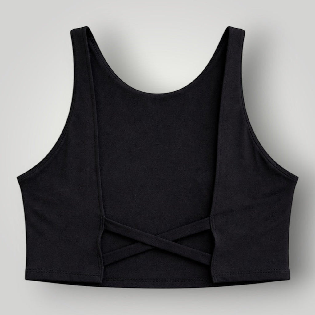 W One Brand Store black polyamide fitness top with X-back design and supportive straps for active wear.