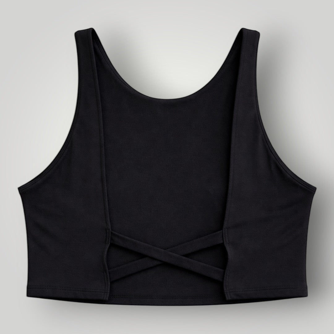 W One Brand Store black polyamide fitness top with X-back design and supportive straps for active wear.