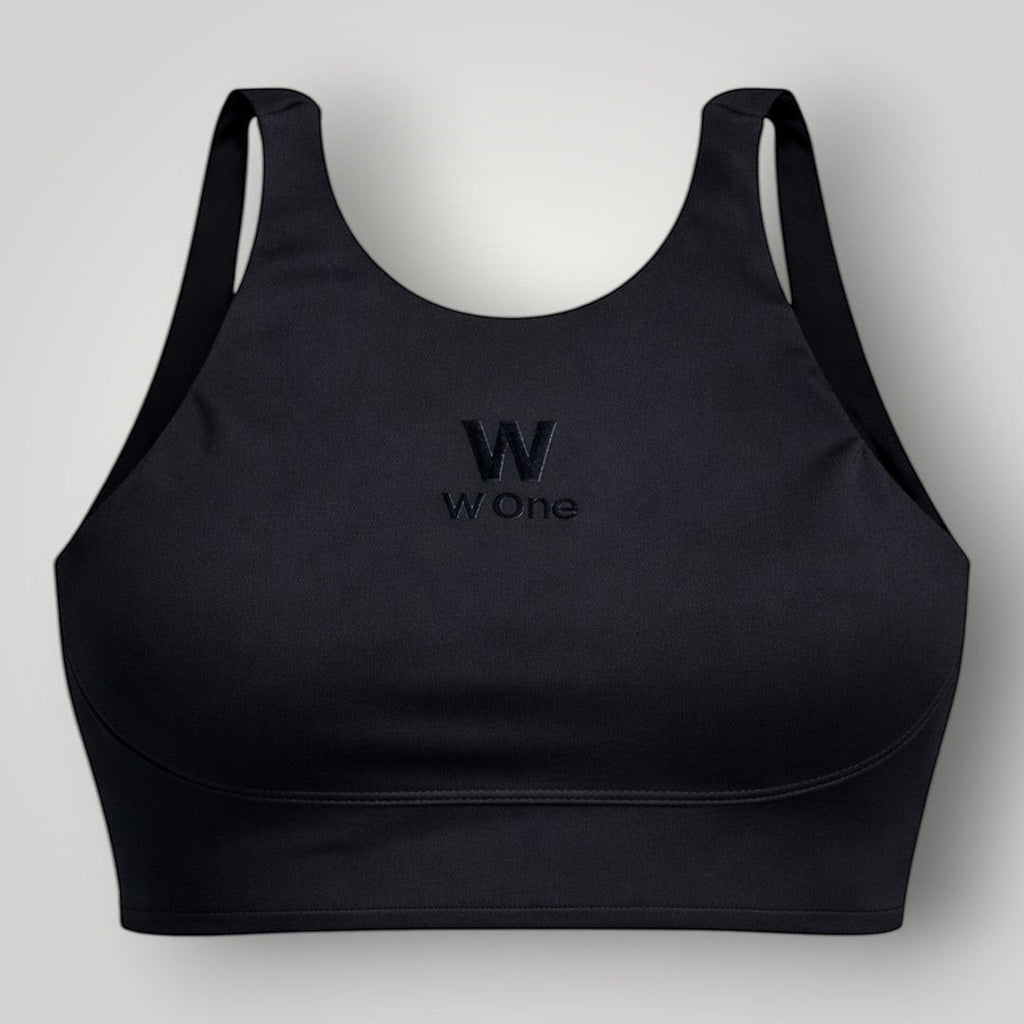 W One Brand Store black polyamide sports bra with X-back design and subtle embroidered logo, ideal for fitness.
