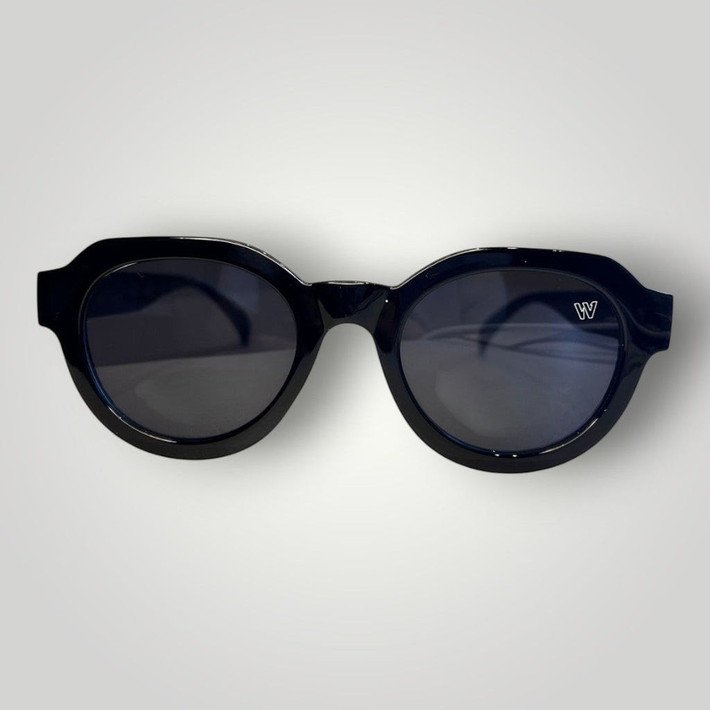 W One Brand Store black acetate round sunglasses with black lenses and subtle 'W' logo detail.