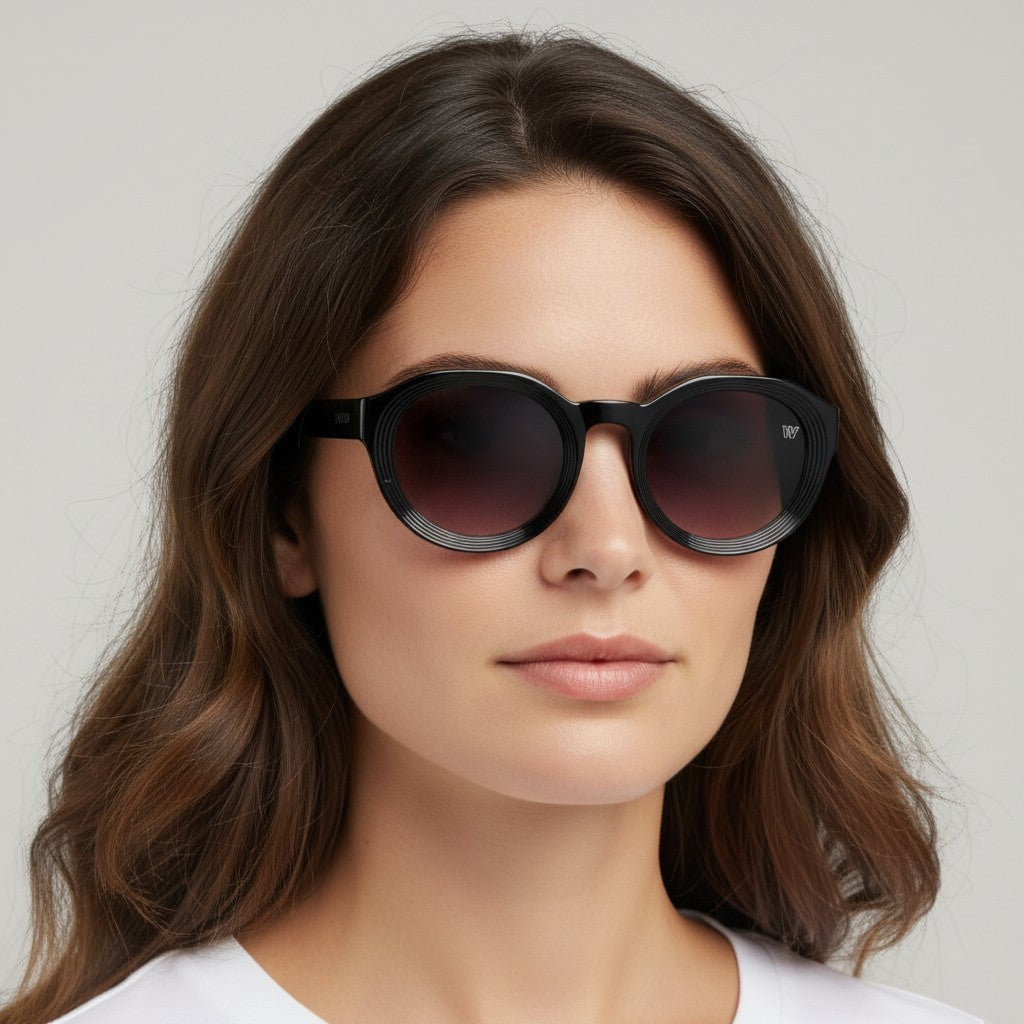W One Brand Store black acetate round sunglasses with gradient smoke lenses and ribbed detail on frames.