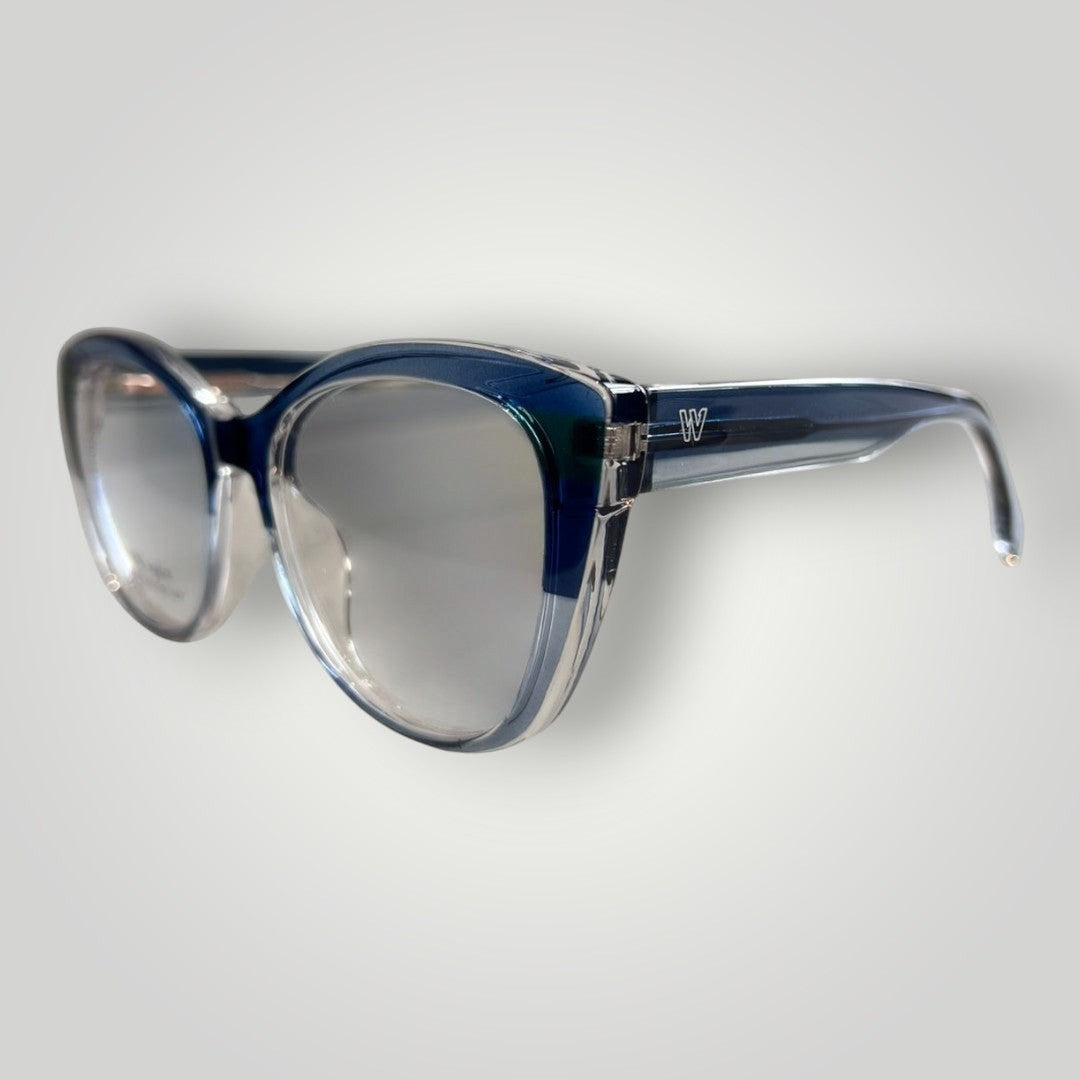 W One Brand Store dark blue and clear transparent acetate cat-eye sunglasses with silver lenses.