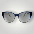 W One Brand Store cat-eye sunglasses in dark blue and transparent light blue acetate with UV400 protection.