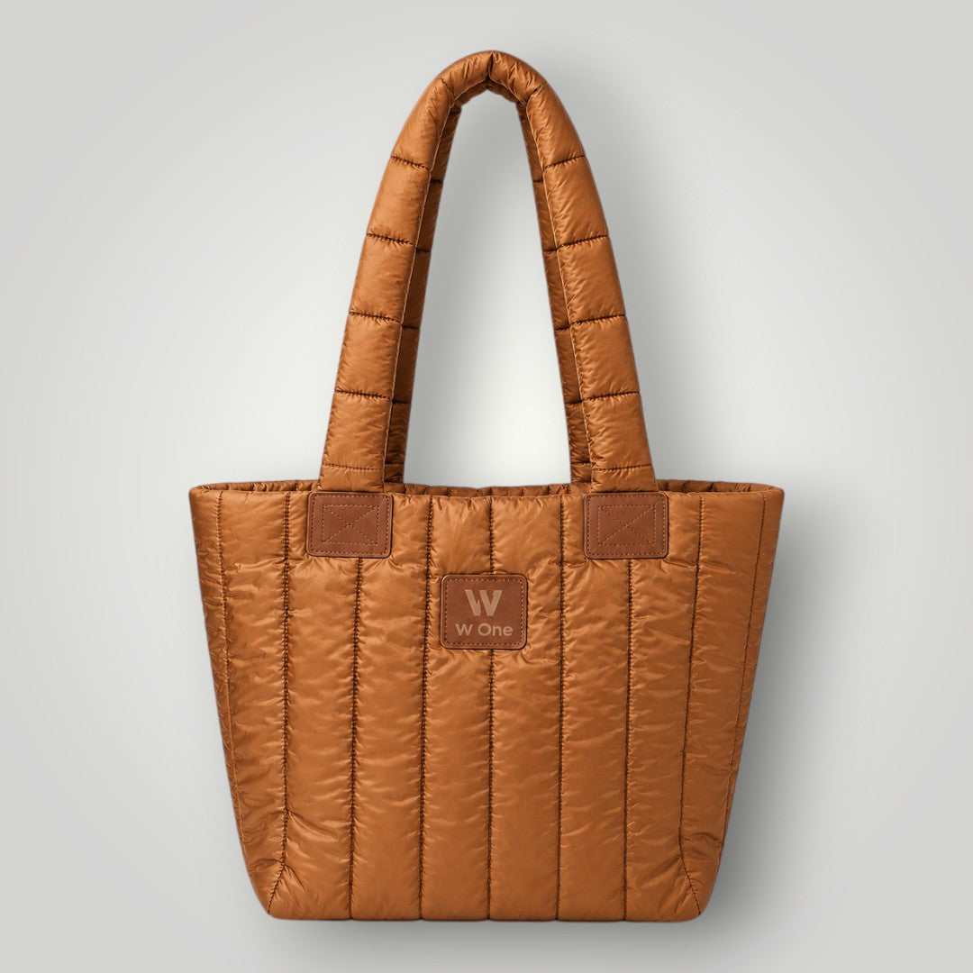 Bolsa W One Brand Store Move Puffer na cor caramelo com acabamento acolchoado e alças reforçadas para o dia a dia.