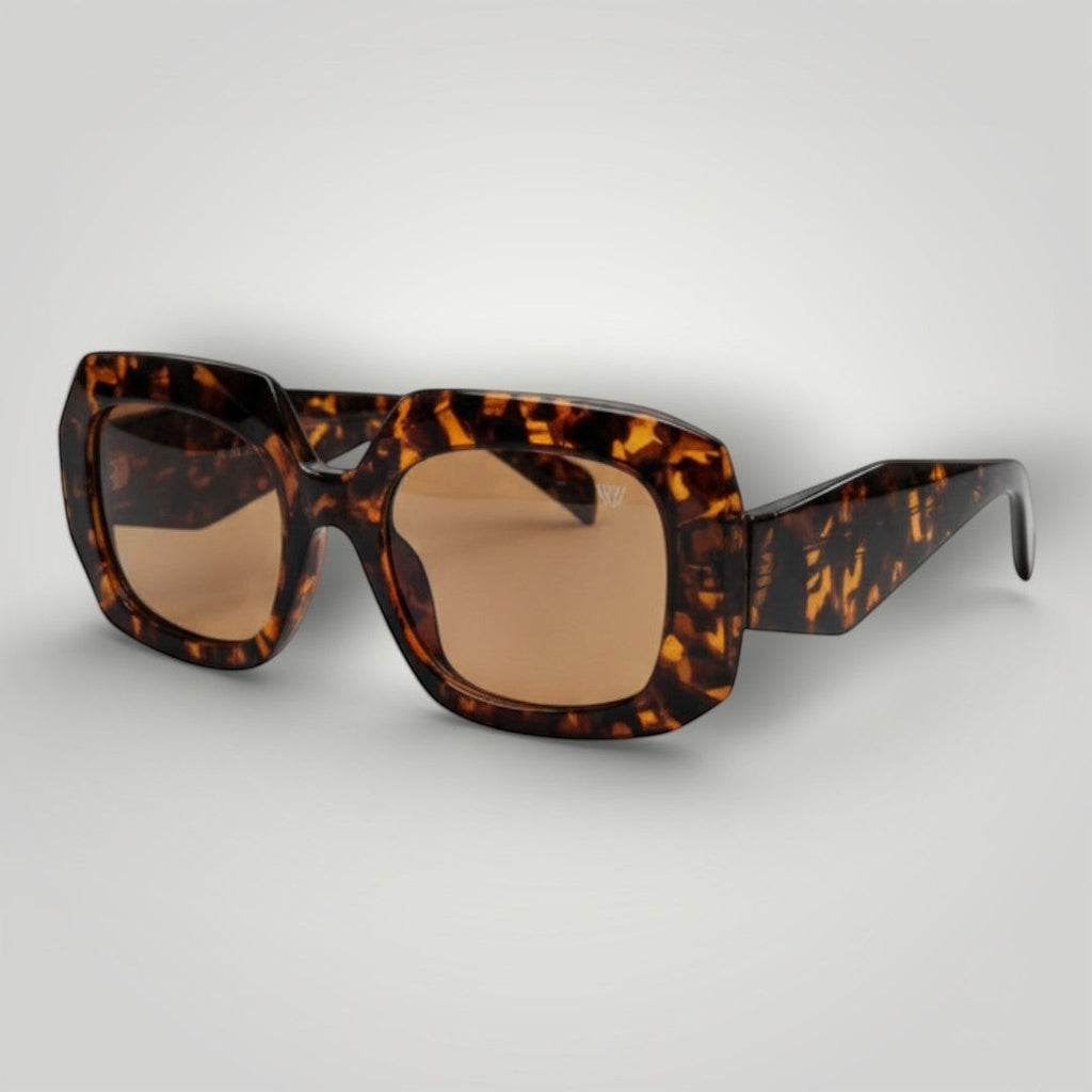 W One Brand Store brown tortoiseshell acetate sunglasses with amber lenses and UV400 protection.
