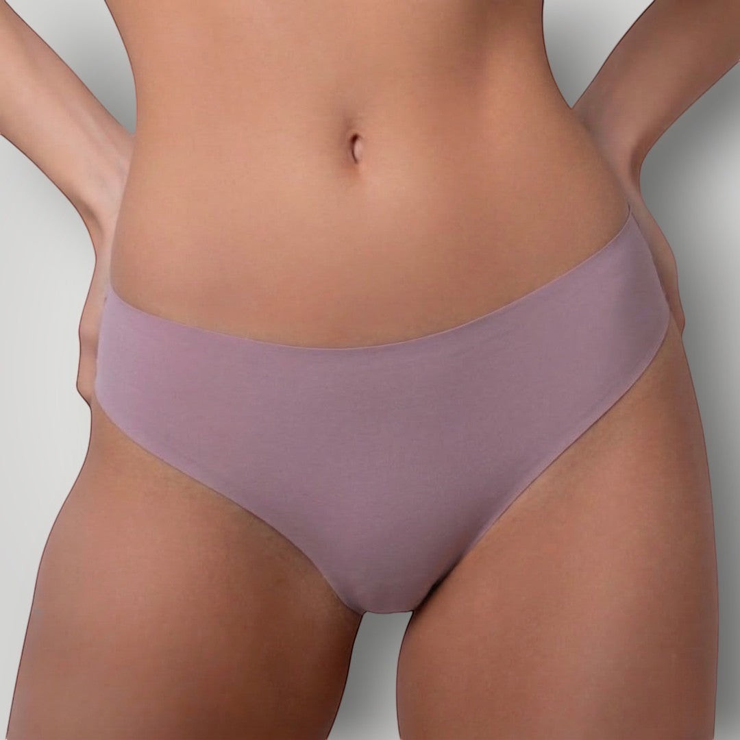 Calcinha tanga W One Brand Store roxa sem costura com laterais largas e cintura média, feita em poliamida e elastano.