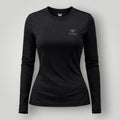 Camiseta W One Brand Store feminina manga longa preta em poliamida com proteção UV e ajuste confortável para treinos