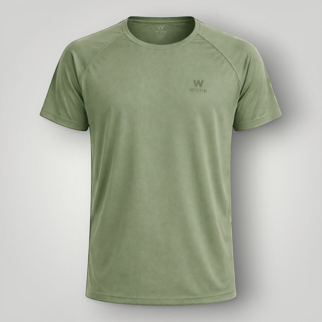 Camiseta W One Brand Store verde malva com recorte raglan em poliamida, leve e respirável para treinos fitness.