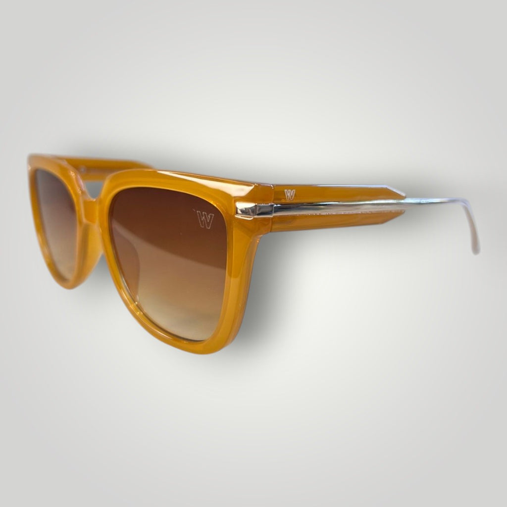 W One Brand Store square caramel acetate sunglasses with metal details and brown gradient lenses.
