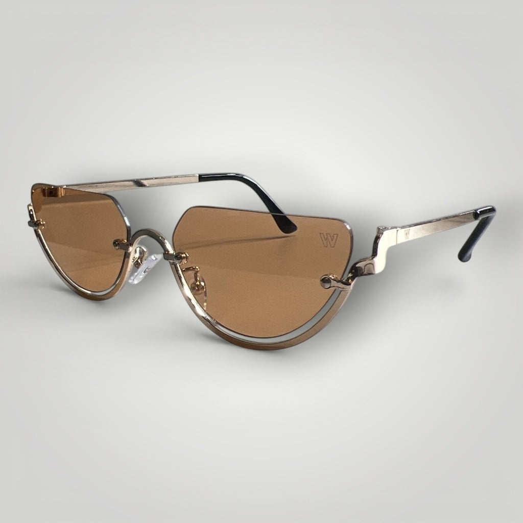 W One Brand Store cat-eye sunglasses with brown lenses and gold metal frame. Fashionable and unique design with UV400 protection.