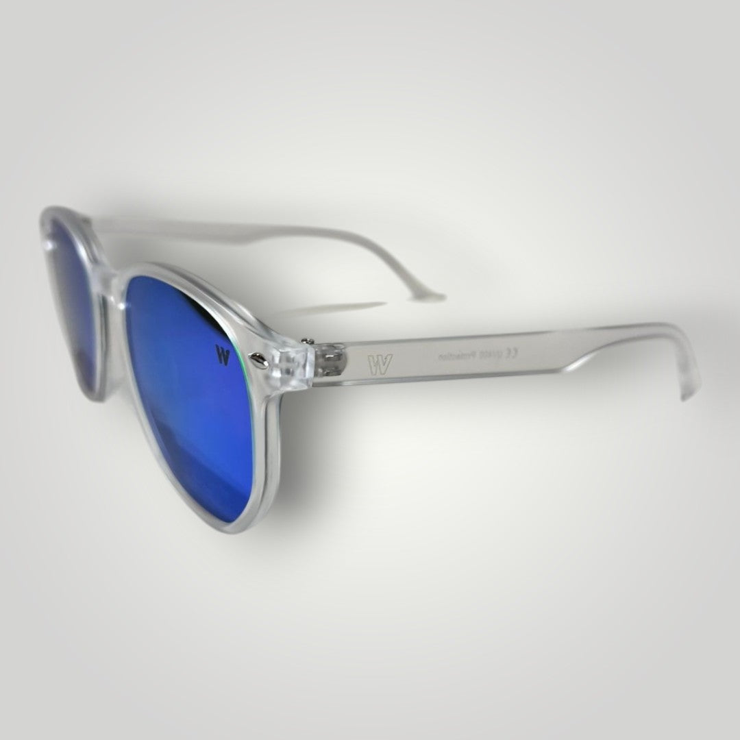W One Brand Store retro-style sunglasses with clear acetate frames and blue mirrored lenses. UV400 protection.