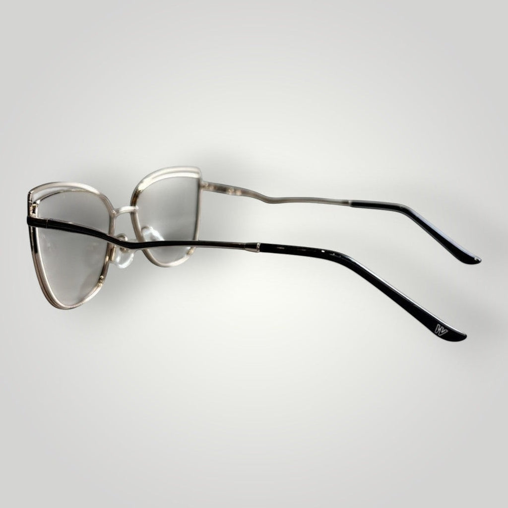 W One Brand Store cat-eye glasses with gold metal frame and black front. Elegant and sophisticated design.