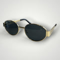 W One Brand Store gold metal round sunglasses with dark grey lenses and UV400 protection.