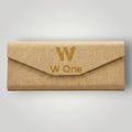 W One Brand Store gold textured glasses case with embossed logo.