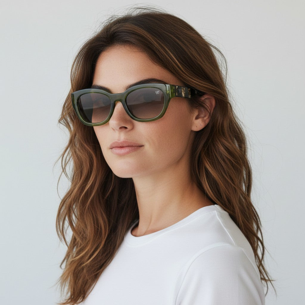 W One Brand Store green acetate cat-eye sunglasses with striped temples and gradient brown lenses, UV400 protection.