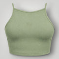 W One Brand Store green malva high-neck fitness crop top with adjustable straps and subtle 'W' logo detail.