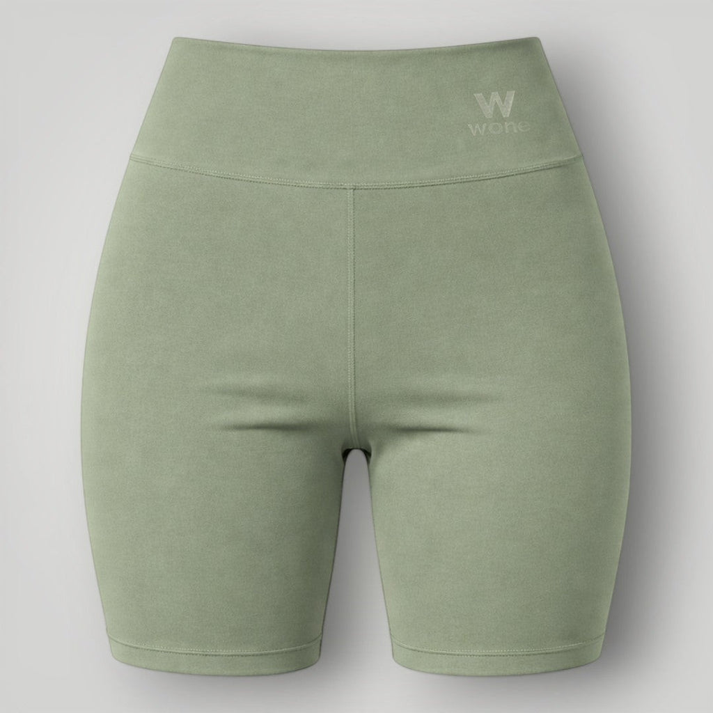 W One Brand Store green polyamide shorts with wide waistband and subtle logo detail, ideal for fitness.