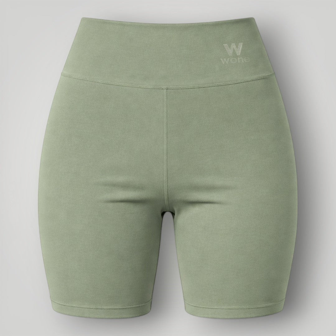 W One Brand Store green polyamide shorts with wide waistband and subtle logo detail, ideal for fitness.