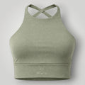 W One Brand Store sage green polyamide sports bra with crossed back straps and subtle embroidered logo.