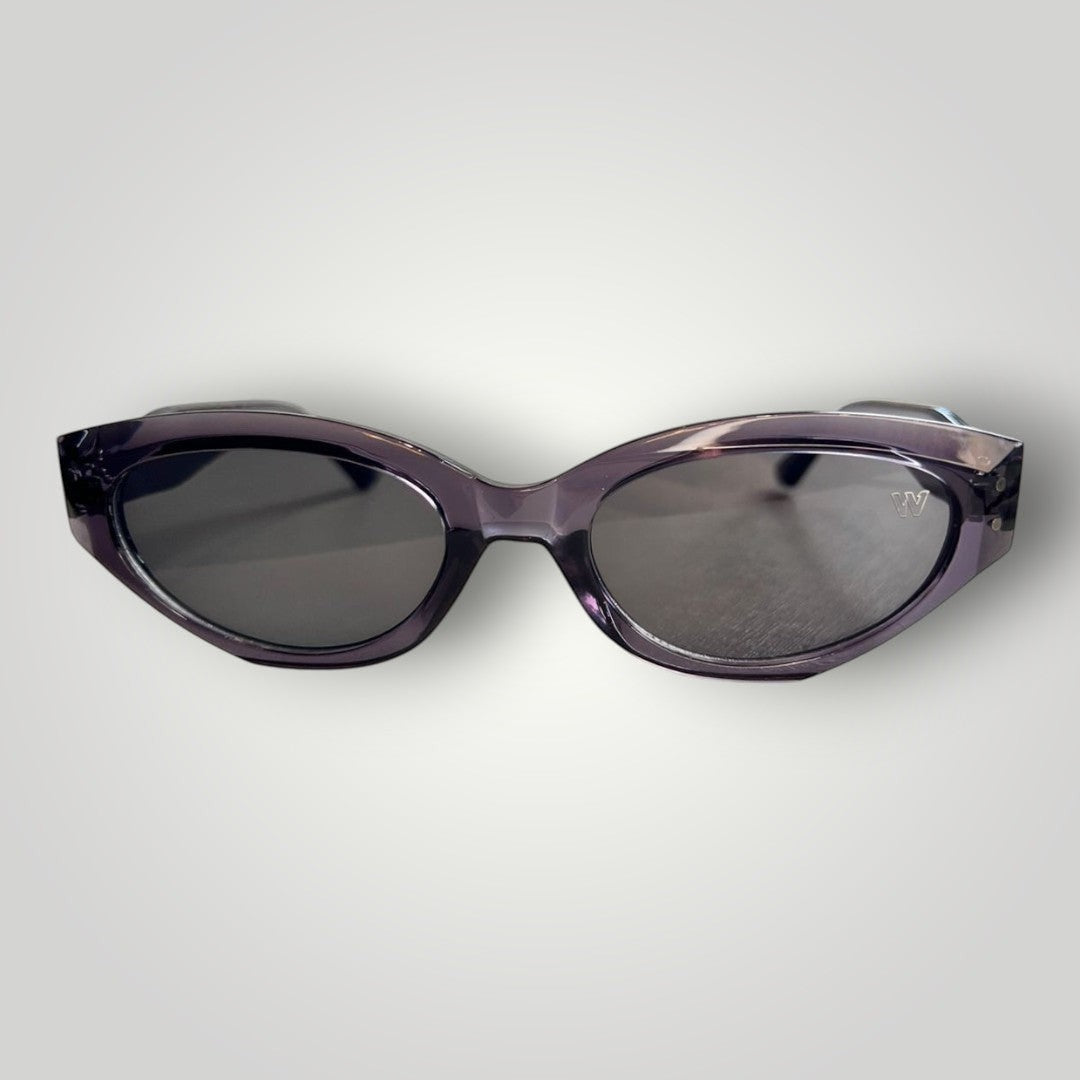 W One Brand Store cat-eye sunglasses in translucent grey acetate with dark grey lenses and UV400 protection.