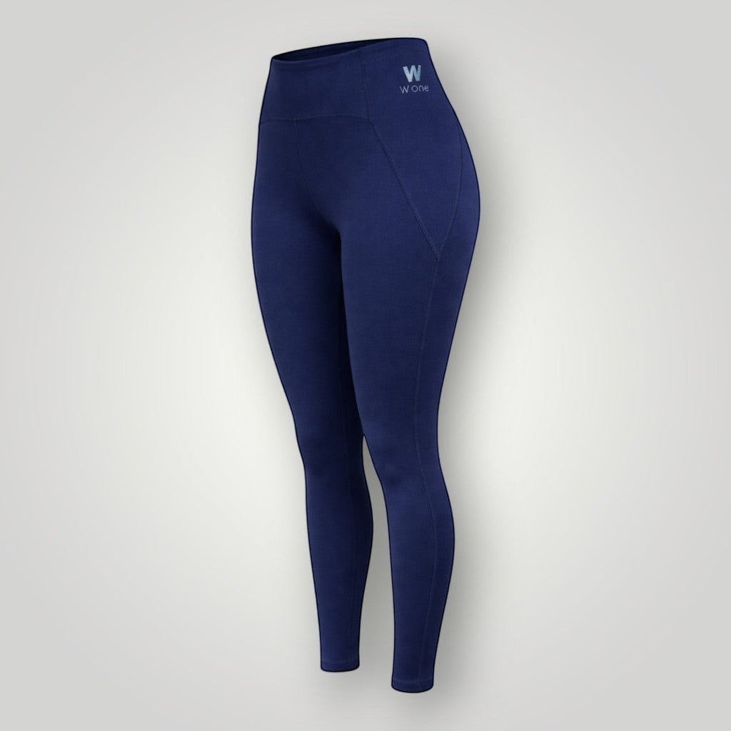 Legging W One Brand Store azul marinho com bolso V lateral, tecido de alta compressão e ajuste confortável ao corpo.