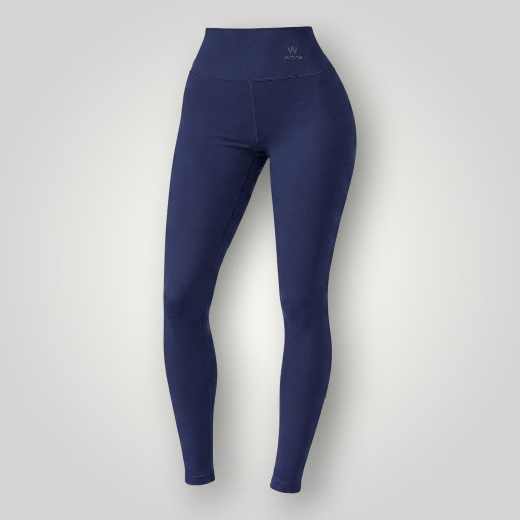Legging Essence W One Brand Store azul marinho de cintura alta, modelagem ajustada e tecido confortável para treinos.