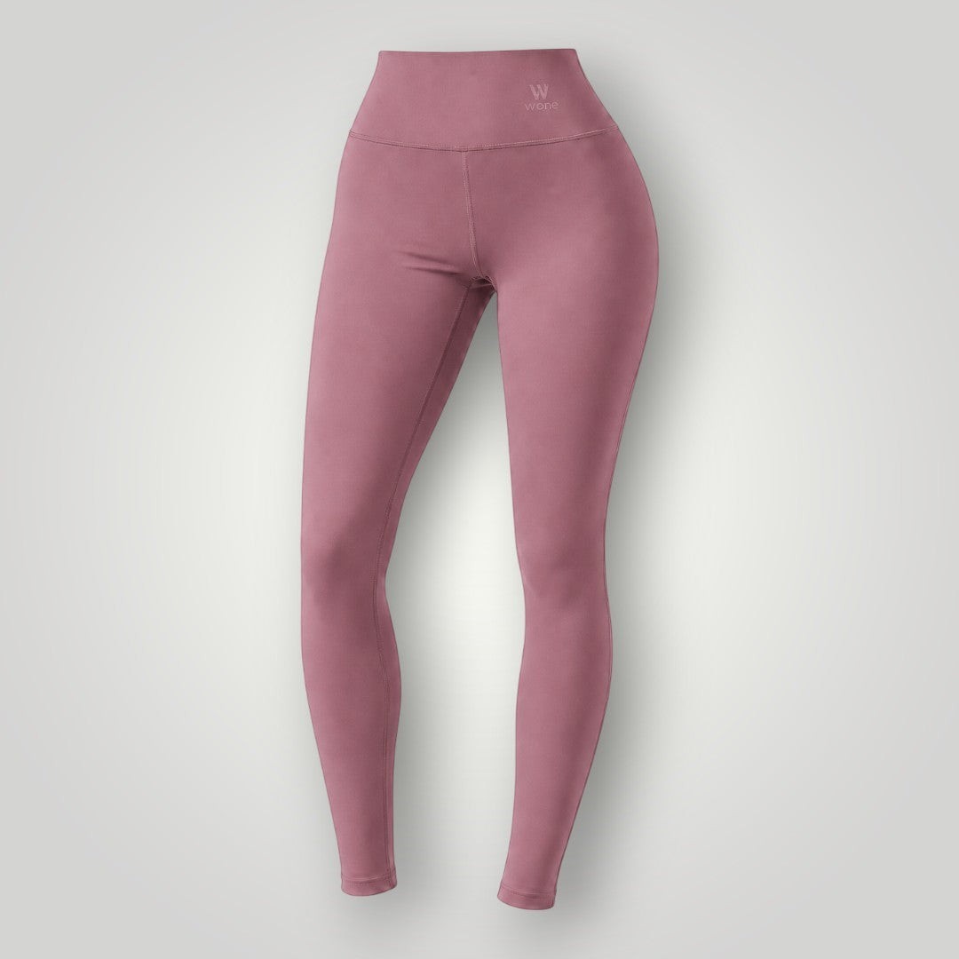 Legging W One Brand Store Essence na cor cacau, com cintura alta, tecido de poliamida e compressão média.