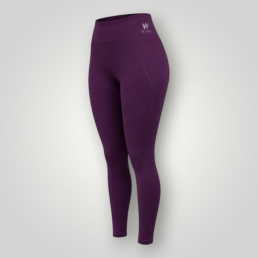 Legging W One Brand Store Performance na cor vinho com bolso lateral em formato V e tecido de alta compressão.