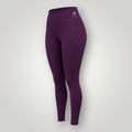 Legging W One Brand Store Performance na cor vinho com bolso lateral em formato V e tecido de alta compressão.