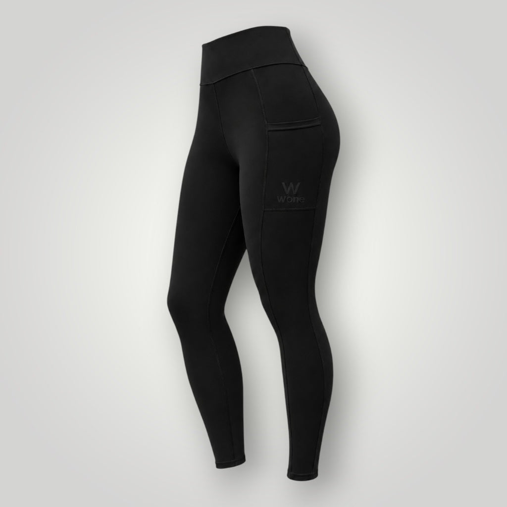 Legging W One Brand Store preta de poliamida com bolso lateral funcional e tecnologia de proteção solar UV