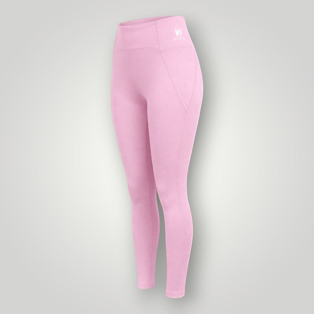 Legging W One Brand Store rosa balé de alta performance com bolso V lateral e tecido de poliamida com proteção solar