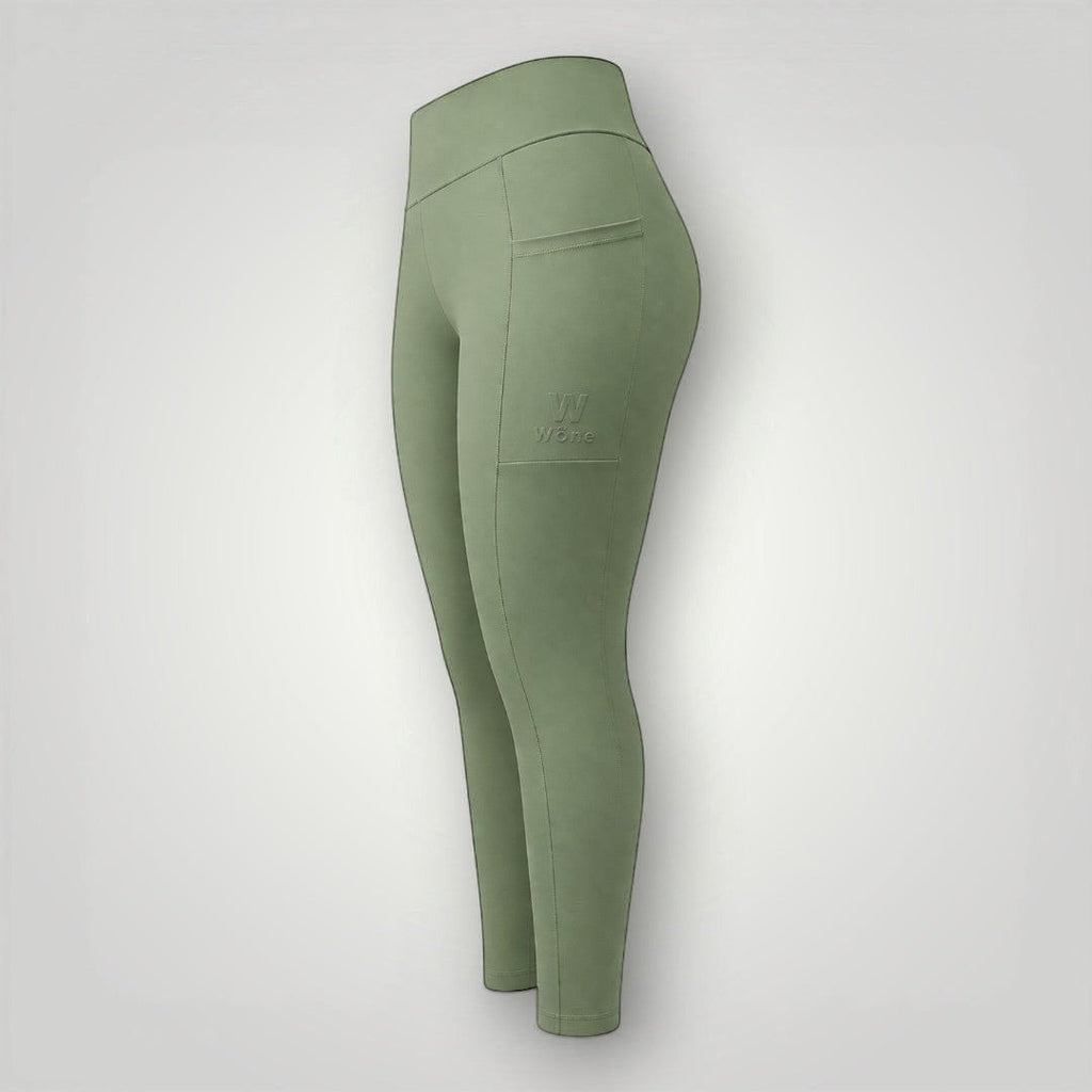 Legging W One Brand Store Move verde malva com bolso lateral, tecido de poliamida com média compressão e ajuste firme.