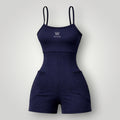 W One Brand Store navy blue polyamide short romper with spaghetti straps and side pockets, ideal for fitness.