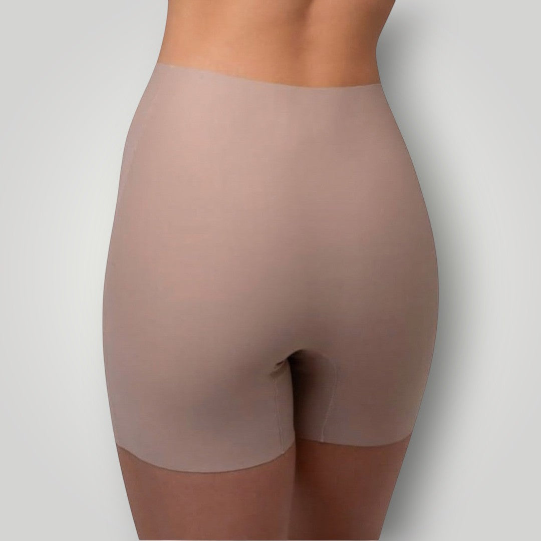 W One Brand Store nude seamless compression shorts made of polyamide and elastane, designed for comfort and shaping.