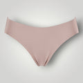 W One Brand Store nude seamless thong with medium sides, made of polyamide and elastane for a comfortable, invisible fit.