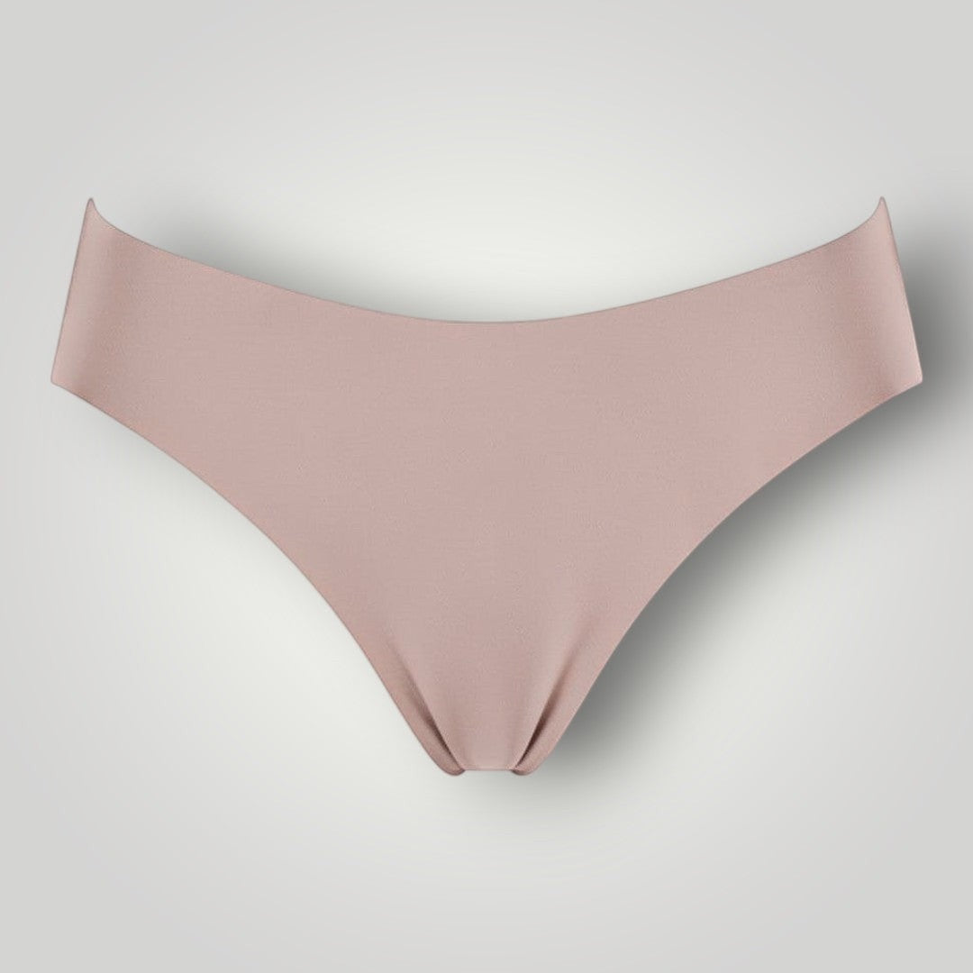 W One Brand Store nude seamless thong with medium sides, made of polyamide and elastane for a comfortable, invisible fit.