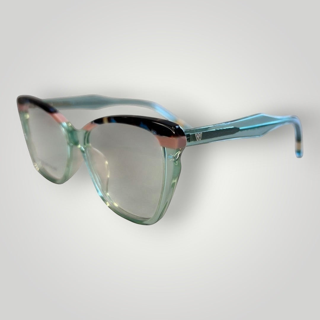 Armação de óculos de grau W One em acetato azul tiffany transparente com design gatinho e detalhes coloridos. Moderno e elegante.