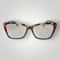 Óculos de grau W One gatinho em acetato com estampa camuflada em vermelho e preto, armação elegante.