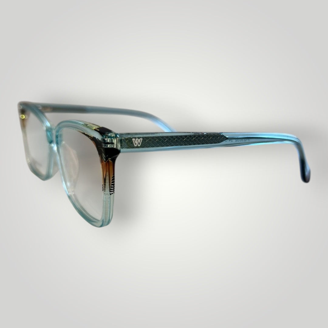Óculos de grau W One retangulares em acetato azul tiffany transparente com detalhes laterais e logo da marca.