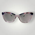 Óculos de grau W One Brand Store em acetato lilás com detalhes superiores e pontas das hastes fumê, armação moderna e elegante.