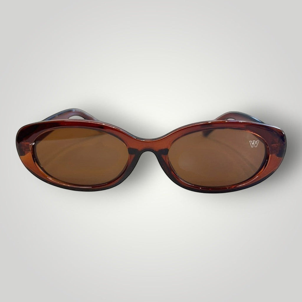 Óculos de sol W One Brand Store com armação oval em acetato marrom e lentes marrons com proteção UV400.